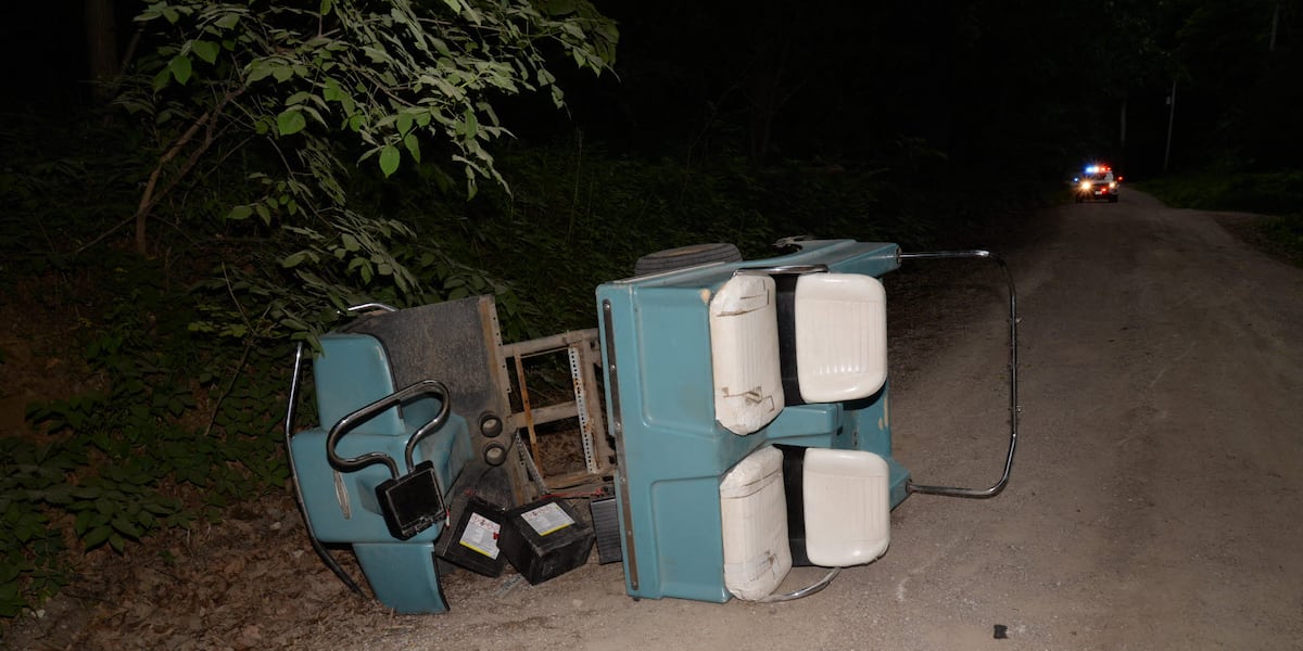 The image shows a roadside scene with a car's dashboard, several stacked white refrigerators, and a police car parked nearby.
AI-generated content may be incorrect.